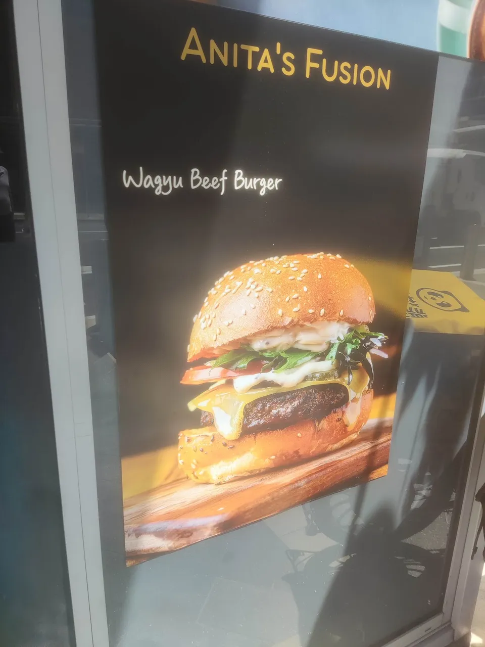 Wagyu Beef Burger promotional sign at Anita's Fusion